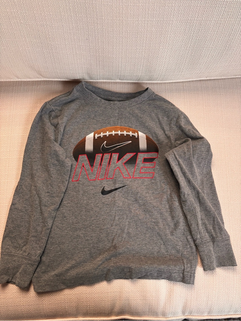 Nike Gray Long Sleeve Tee with Football Graphic and Pink Logo